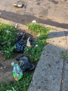 One on the Sidewalk, Another on the Street