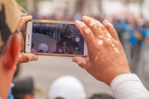 Through a Mobile Device